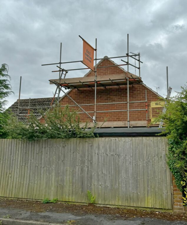 Rebed of verge tiles with new undercloke in Alcester 1