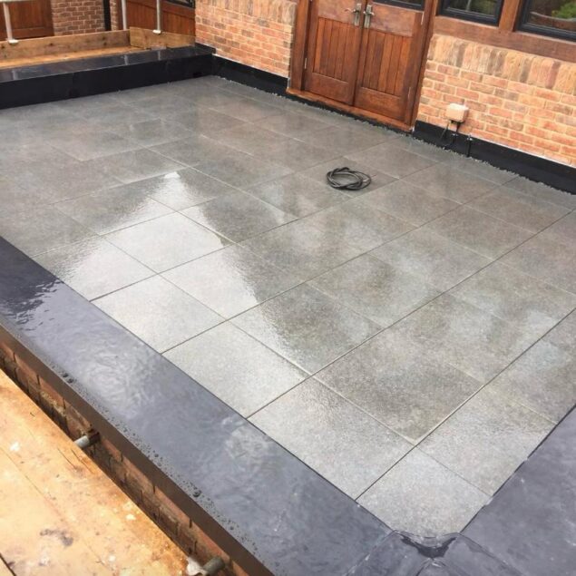 Balcony flat roof using Rubberbond then final finishing so as to create safe usable area for client
