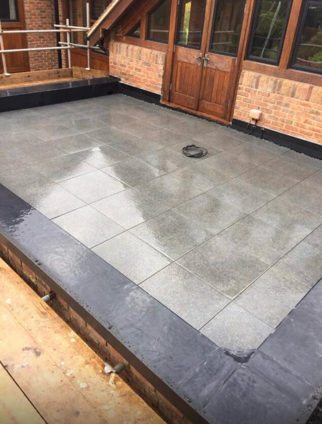 Balcony flat roof using Rubberbond then final finishing so as to create safe usable area for client